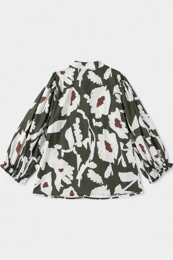 Filomena - Blusa con Media Botonadura y Manga Abullonada en Estampado Floral Abstracto