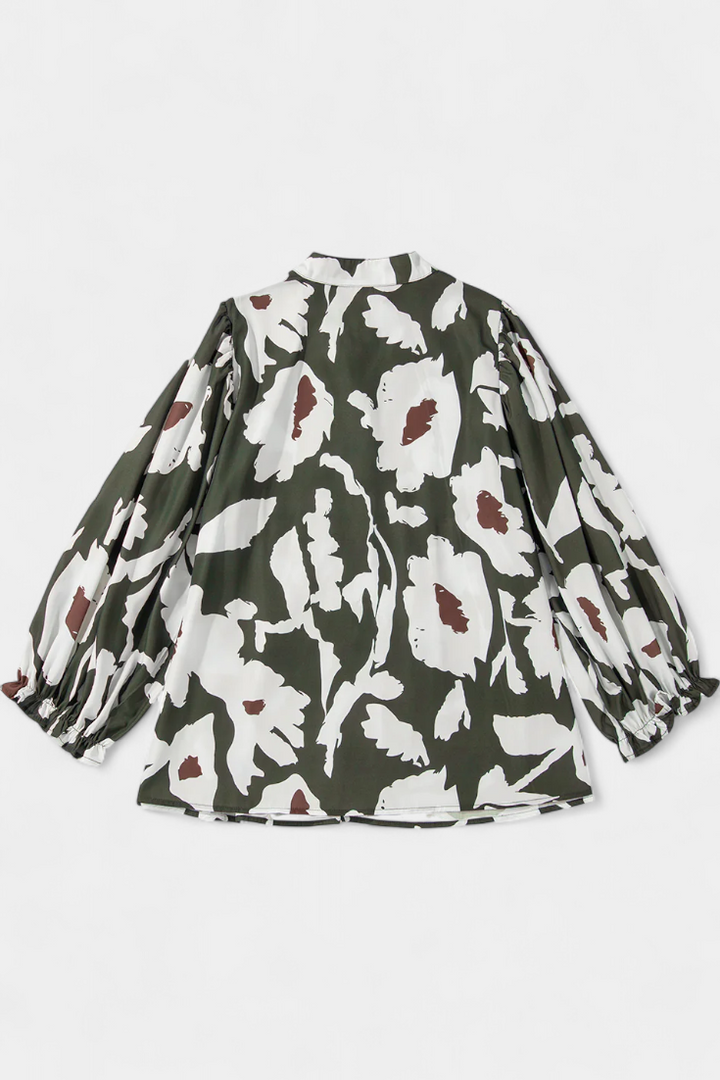 Filomena - Blusa con Media Botonadura y Manga Abullonada en Estampado Floral Abstracto