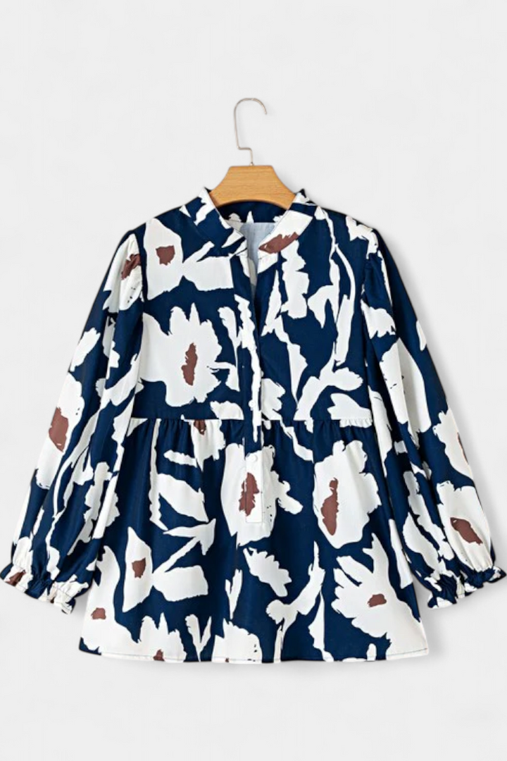 Filomena - Blusa con Media Botonadura y Manga Abullonada en Estampado Floral Abstracto