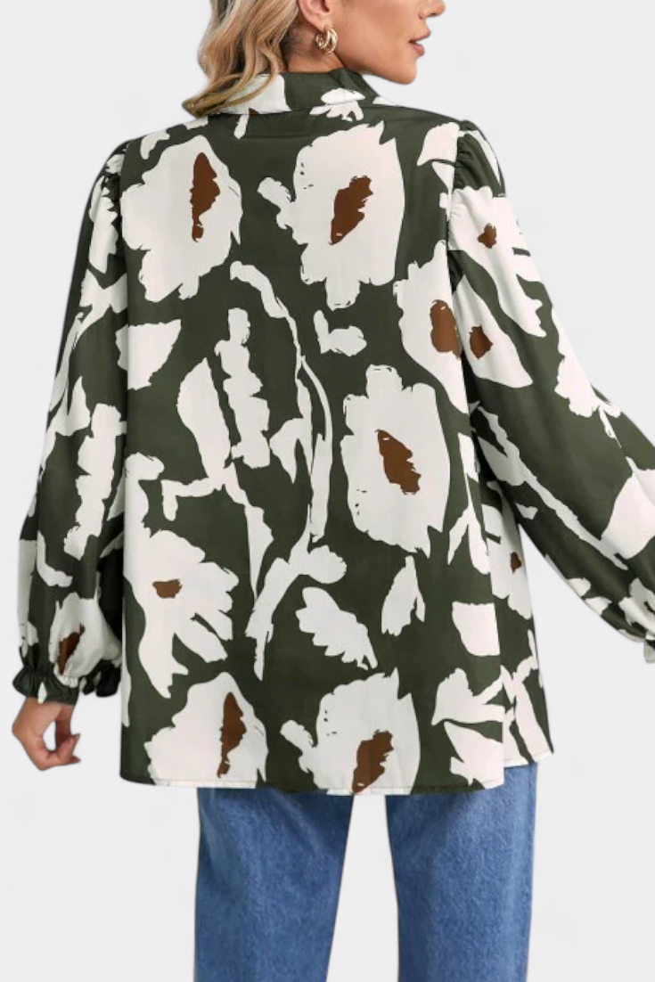 Filomena - Blusa con Media Botonadura y Manga Abullonada en Estampado Floral Abstracto