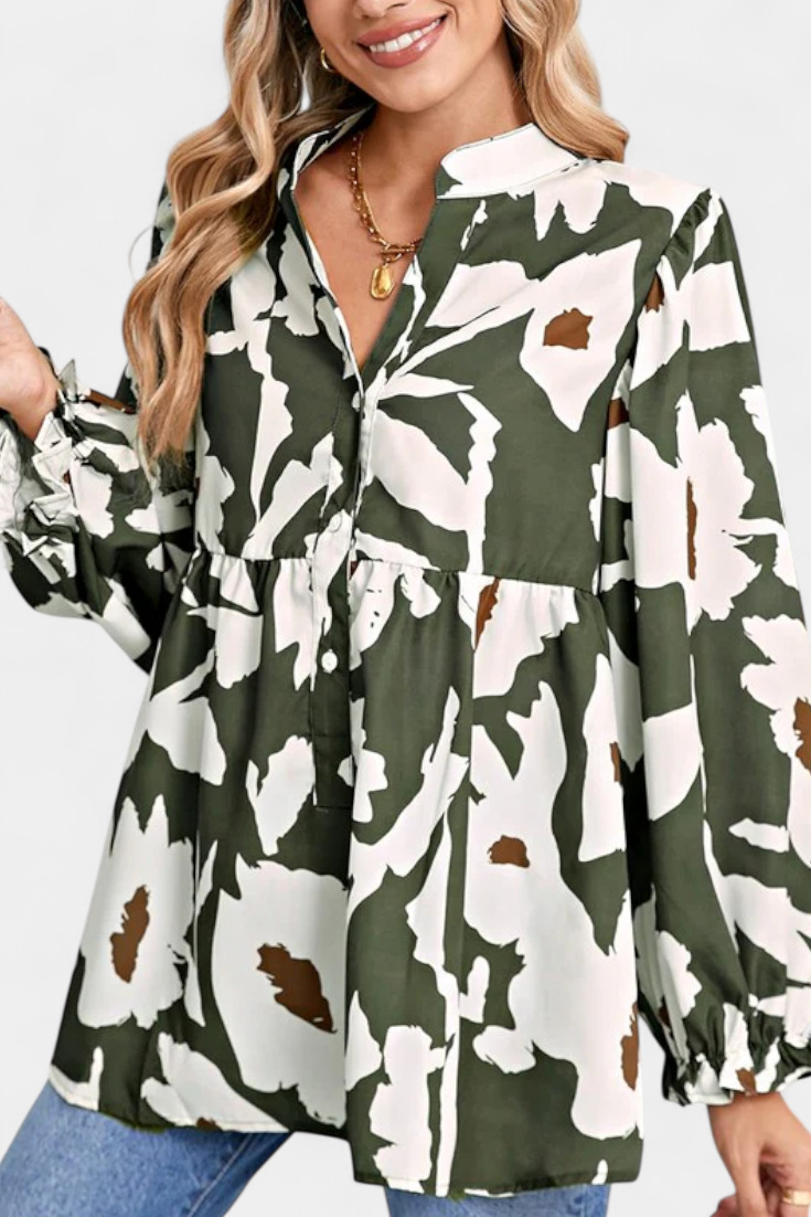 Filomena - Blusa con Media Botonadura y Manga Abullonada en Estampado Floral Abstracto